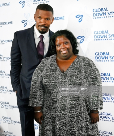 DENVER, COLORADO - NOVEMBER 12: Movie star Jamie Foxx poses on the red carpet with his sister DeOndra Dixon while attending the Global Down Syndrome Foundation's 2016 'Be Beautiful, Be Yourself' fashion show at the Hyatt Regency Hotel on November 12, 2016 in Denver, Colorado. A night of advocacy, and empowerment, the event is the single largest fundraiser benefitting people with Down syndrome in the world, having raised over $12 million to date. (Photo by Helen H. Richardson/The Denver Post via Getty Images)